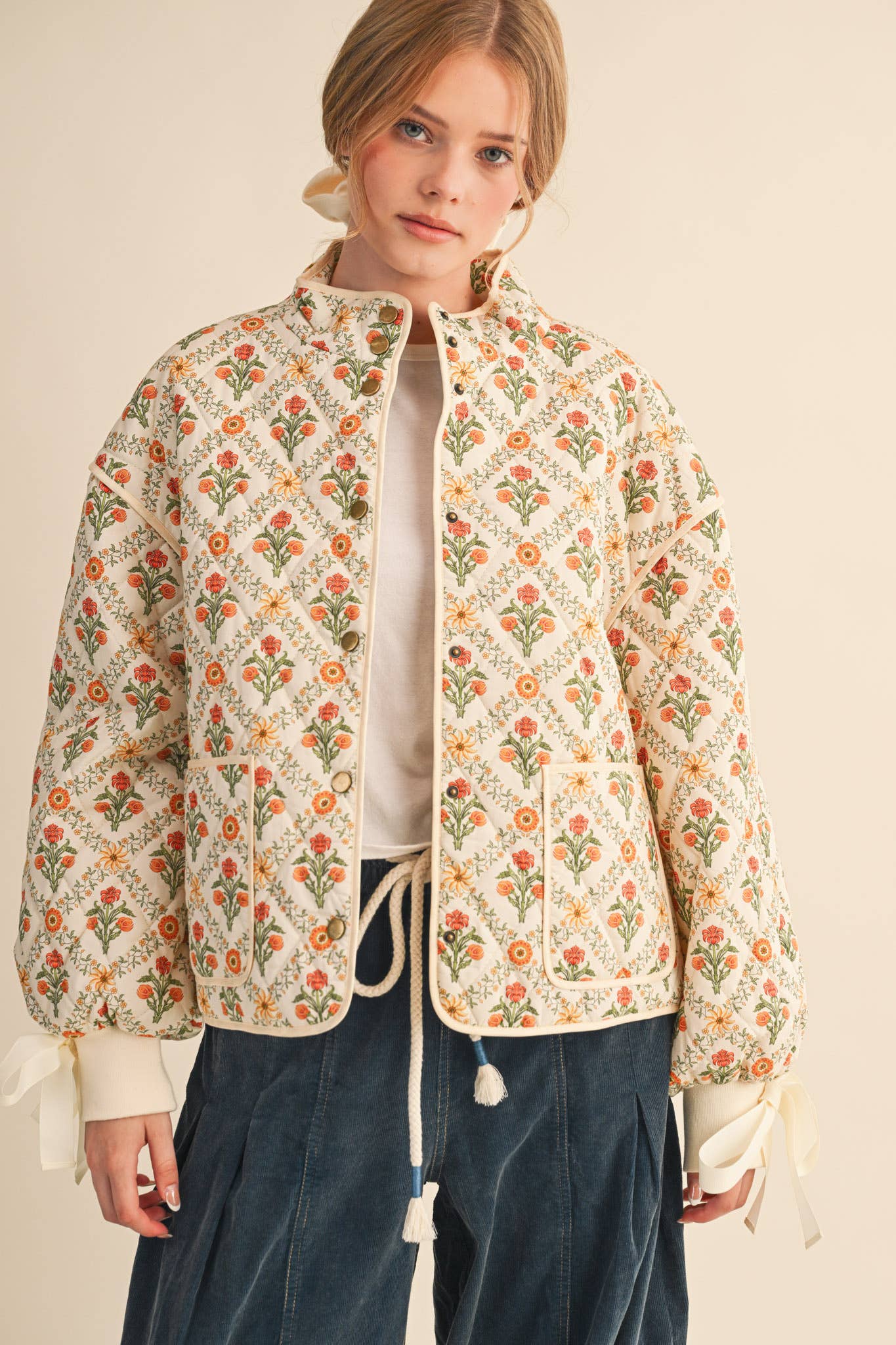 FLORAL QUILTED JACKET WITH RIBBON DETAIL MJK4431