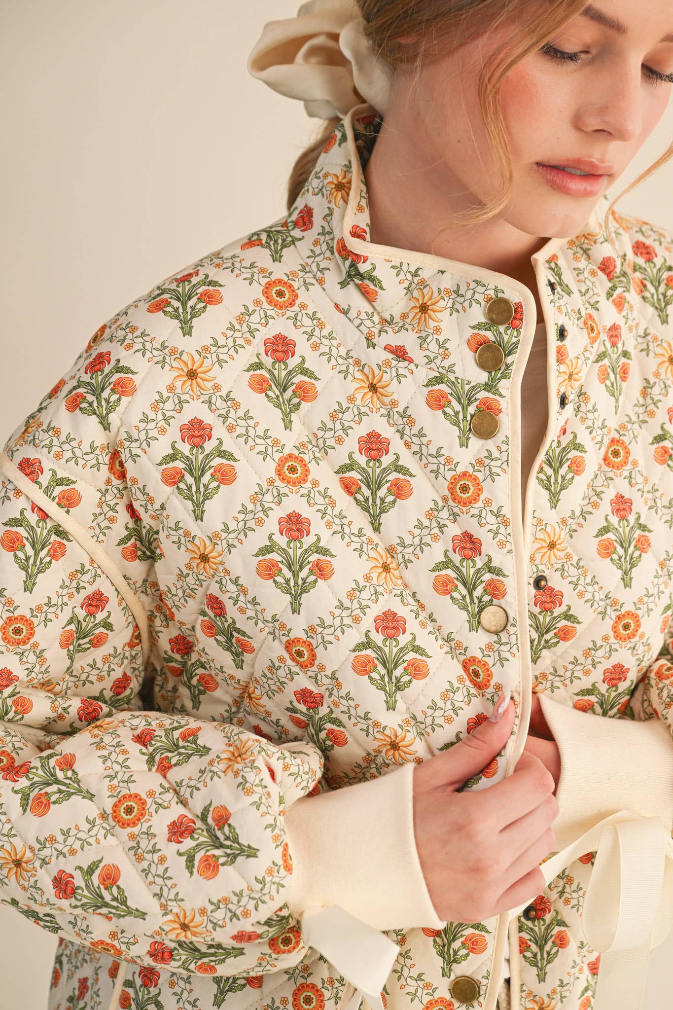 FLORAL QUILTED JACKET WITH RIBBON DETAIL MJK4431
