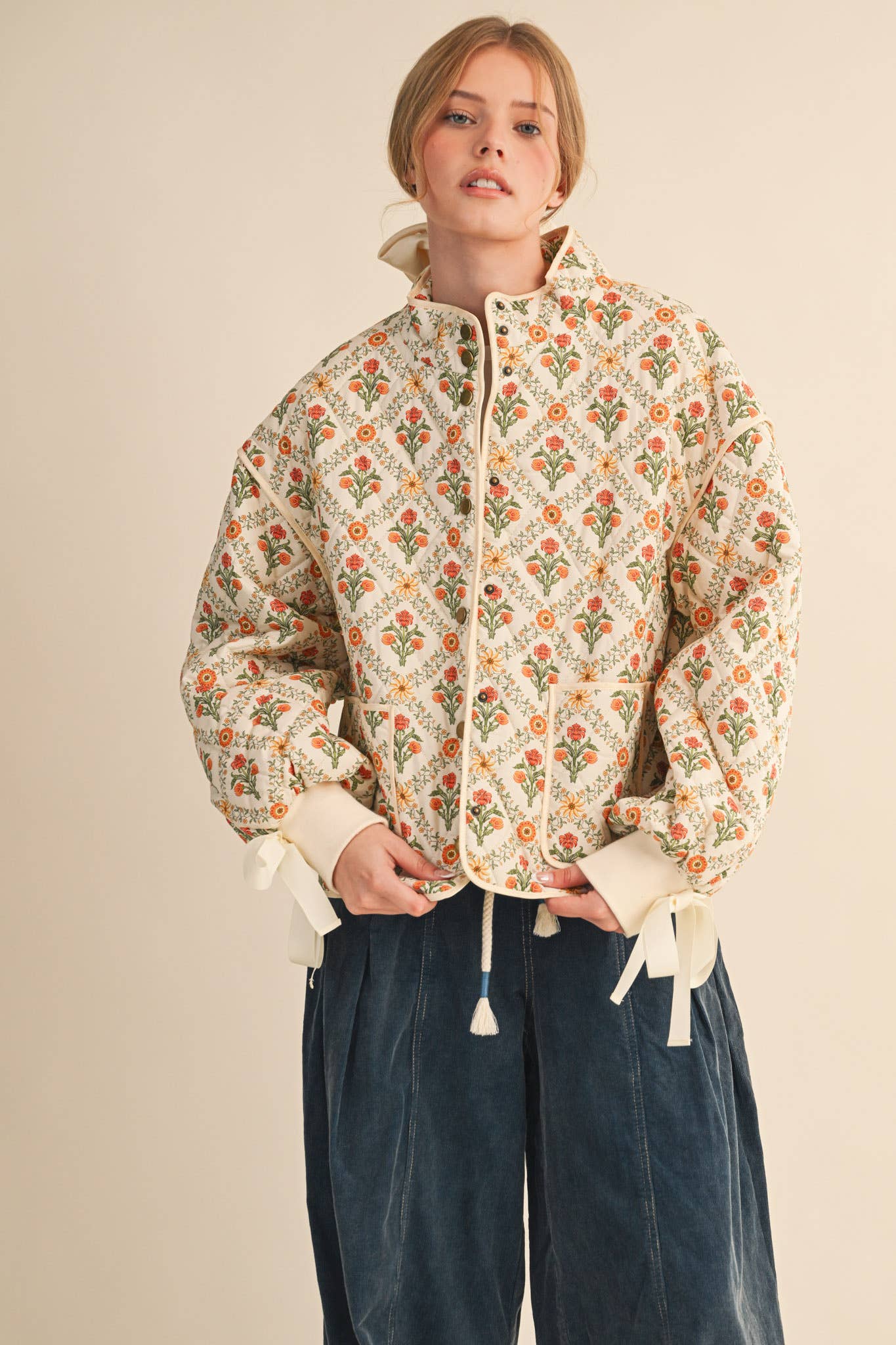 FLORAL QUILTED JACKET WITH RIBBON DETAIL MJK4431