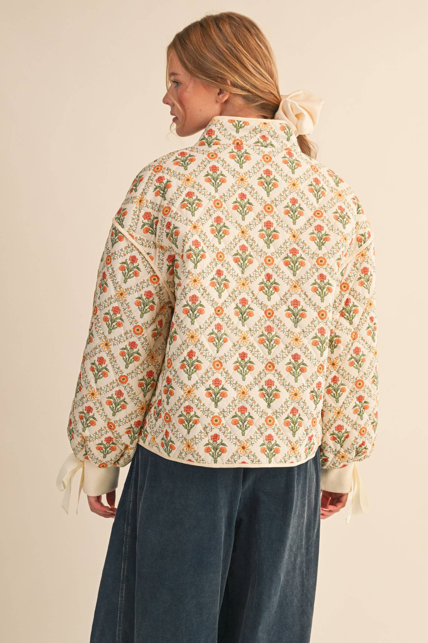 FLORAL QUILTED JACKET WITH RIBBON DETAIL MJK4431