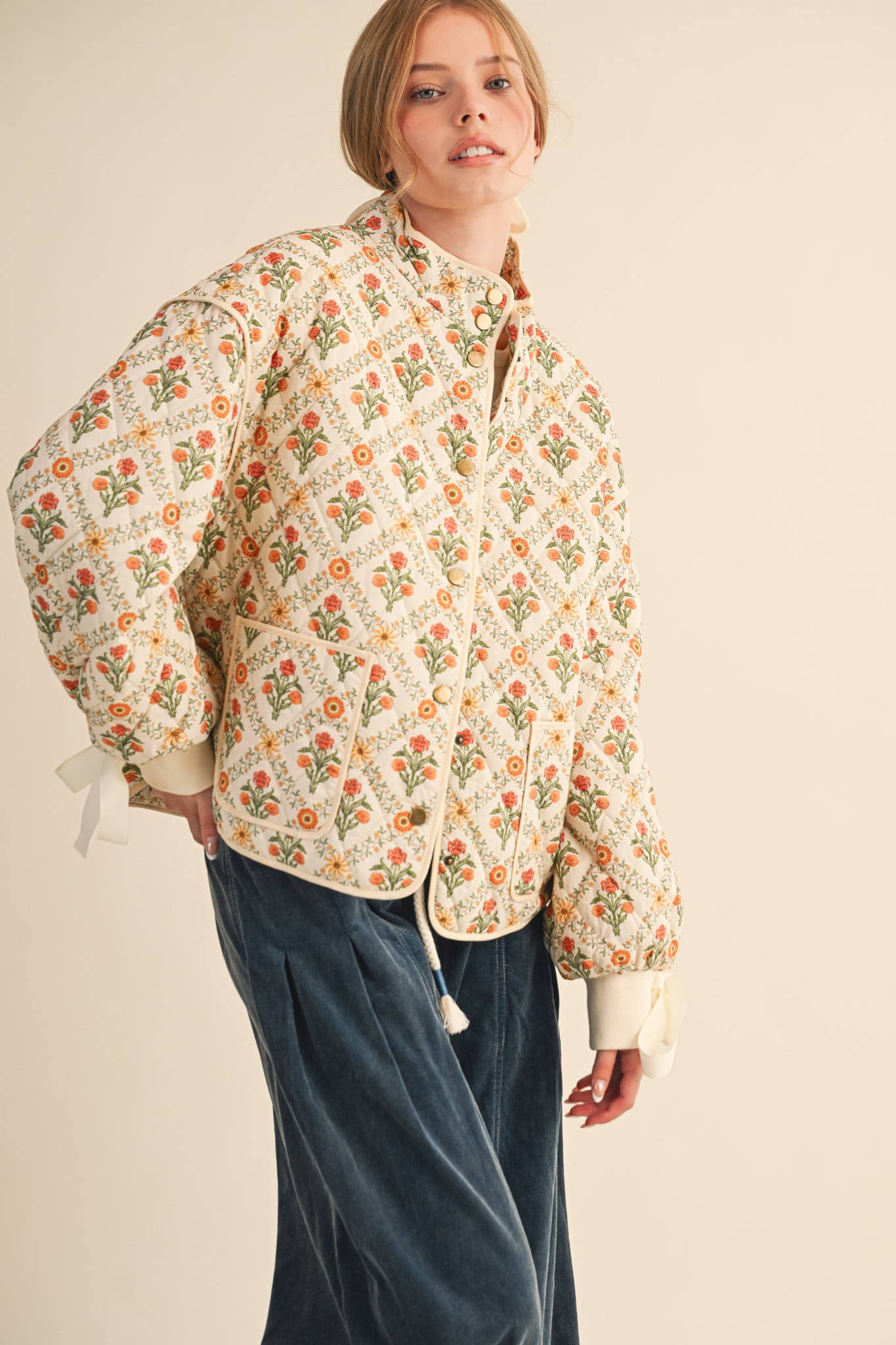 FLORAL QUILTED JACKET WITH RIBBON DETAIL MJK4431