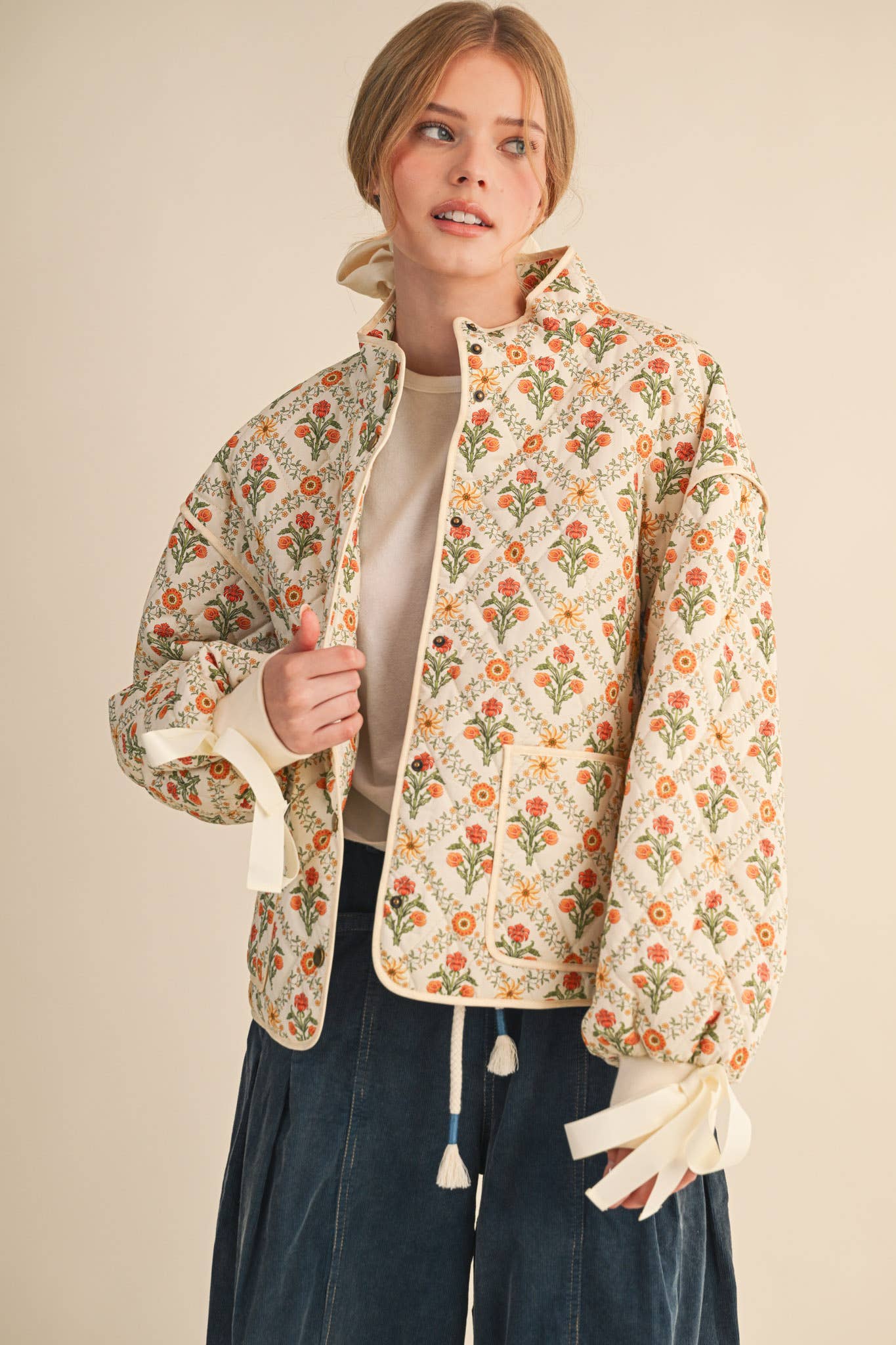 FLORAL QUILTED JACKET WITH RIBBON DETAIL MJK4431