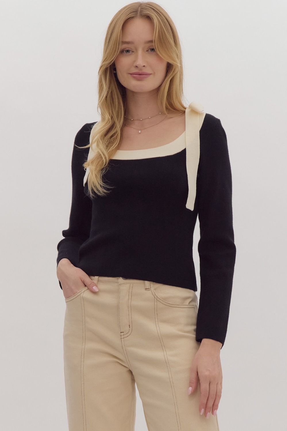 Entro black top with cream bows
